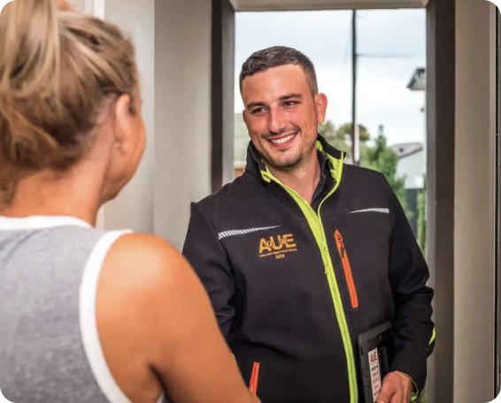 AUE Electrician providing top-rated services in Adelaide, greeting customers with enthusiasm.